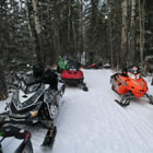Photo of a parked snowmobiles