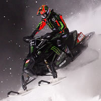 Tucker Hibbert riding snowmobile