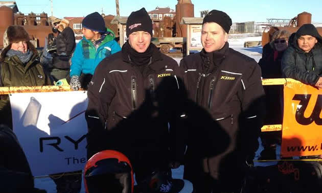 Mike Morgan and Chris Olds were the leaders at the midway point of the grueling 2014 Iron Dog cross-country snowmobile race across Alaska. 