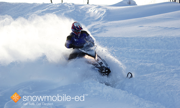 Person enjoying a snowmobile ride