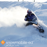 Person enjoying a snowmobile ride