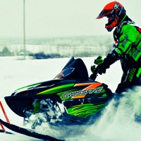 A snowmobiler out on a ride.