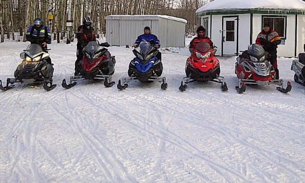 Riders in front of Rosie' Roundhouse Shelter in th Greewater Lake area. 