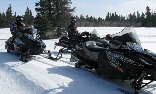 2 sledders on a trail in near Holland MB.
