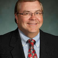 CFO Tim Delmore retires May 31, 2014