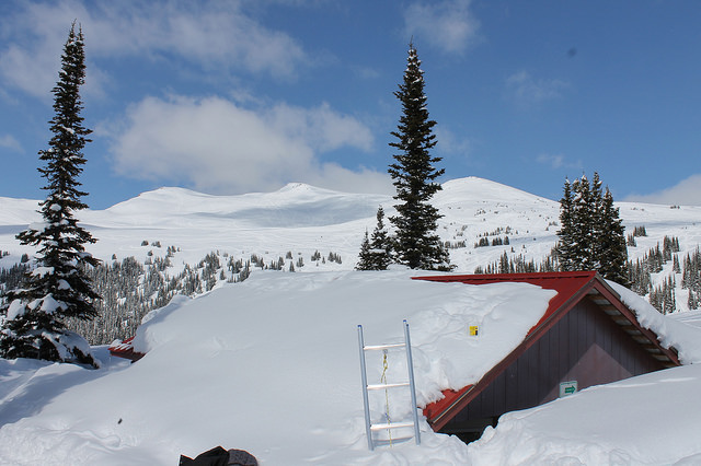 One of McBride Big Country Snowmobile Association's warm up cabins nearly buried by snow.