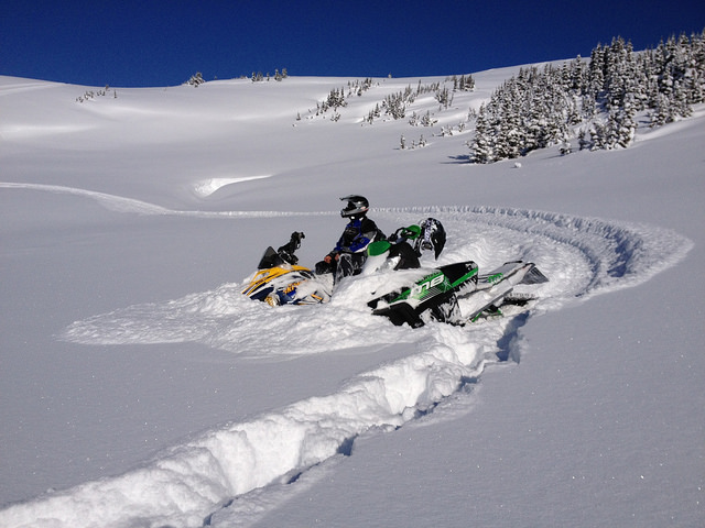 Ashley Roney and Justin Bowes taking a break in the Telkwa Range