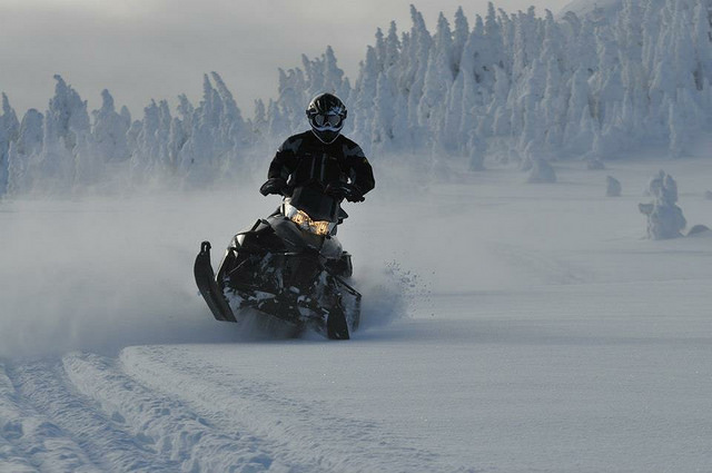 Ashley Roney carving pow at Morice Mountain