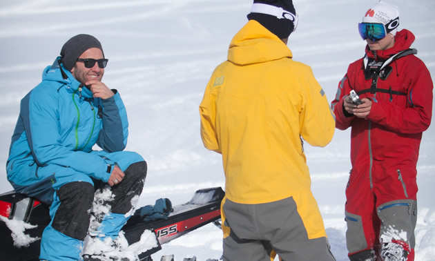 Chris Brown sitting on sled. 