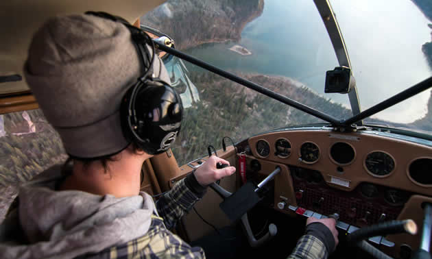 Dave England flying his plane. 