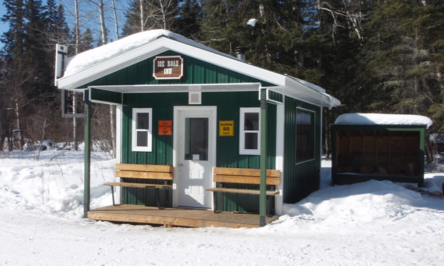 A well appointed snowmobile warm up shelter. 