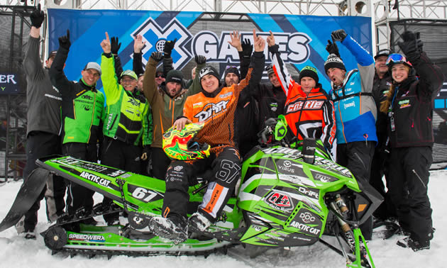 Ryan Simons and the Arctic Cat support crew on the podium at X Games. 