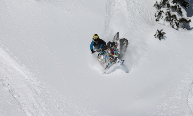 Jamie Iwaschuk sidehilling a sled. 