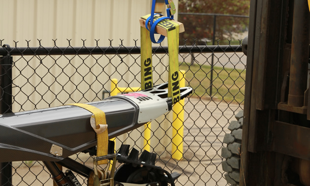 Using a forklift to test the strength of the Yeti rear bumper and chassis. 