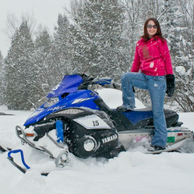 Courtney Fender is a fervent snowmobile drag racer. 