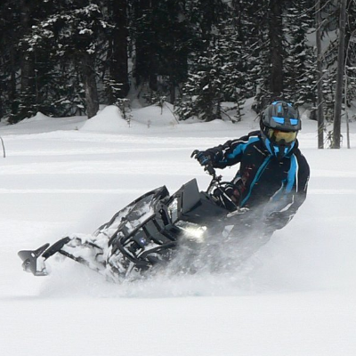 Jan DeRepentigny rides her 2017 800 Polaris Pro in the snow.