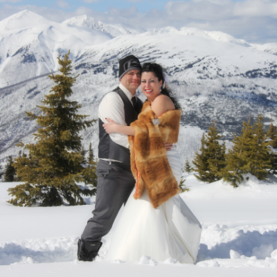 Tyler and Vicki Barrett rode snowmobiles to the top of Lucille Mountain on their wedding day for a once-in-a-lifetime photo shoot.