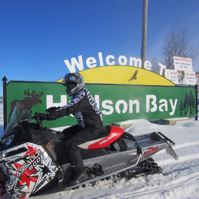 Corrina Kapeller rides by the entrance to Hudson Bay.