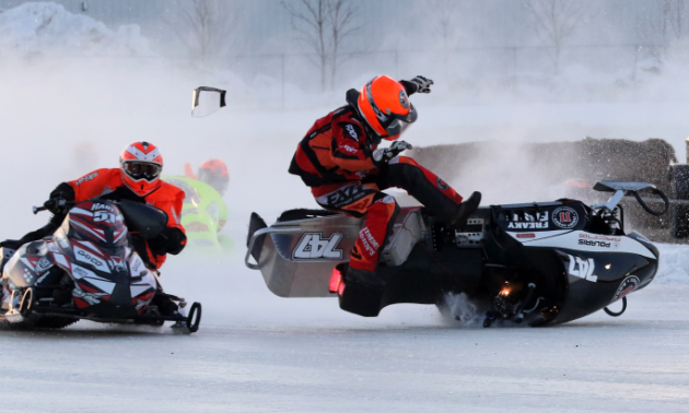 Snowmobile racer Jordan Wahl is jettisoned from his snowmobile during a spectacular crash.