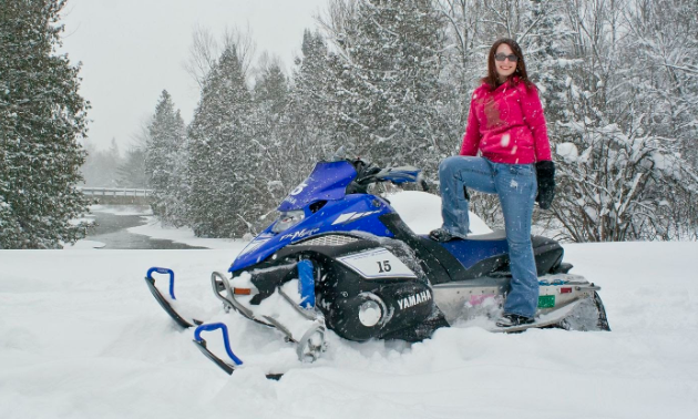 Courtney Fender is a fervent snowmobile drag racer. 