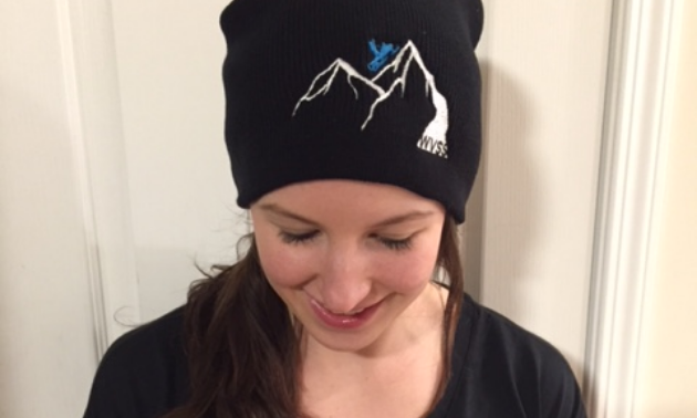 Gary Prosser's daughter sports a toque with the Windermere Valley Snowmobile Society's new logo. 