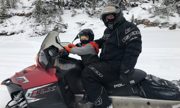 Dwayne Wenger took his grandson, Cohen McCombie, on Trail 203A going to Denare Beach from Creighton, Saskatchewan. 