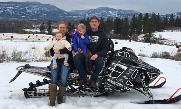 Justin Evans and Kyra Casorso have passed on their love of snowmobiling to their children.