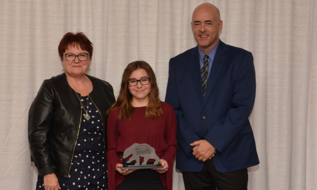 Morgan Nelson received the ASA Excellence Award for Outstanding Youth Contribution Towards the Continued Development of Family Snowmobiling on October 13, 2018. 