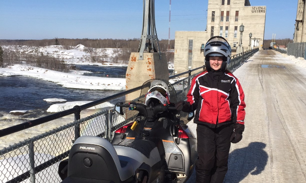 Peter Koehn and his daughter, Victoria (pictured), enjoy going for rides through the Pinawa and Lac du Bonnet areas in Manitoba. Here they are atop the power station at Seven Sisters Generating Station.