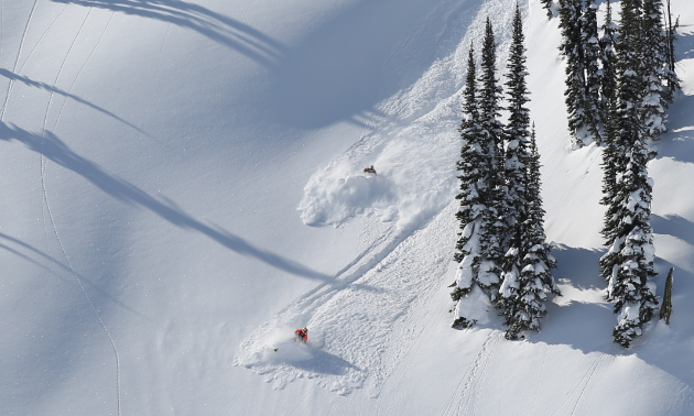 Rene St. Onge and a friend make fresh tracks.