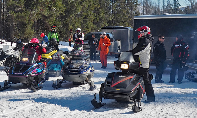 Snowmobilers waiting to head off down the trail. 