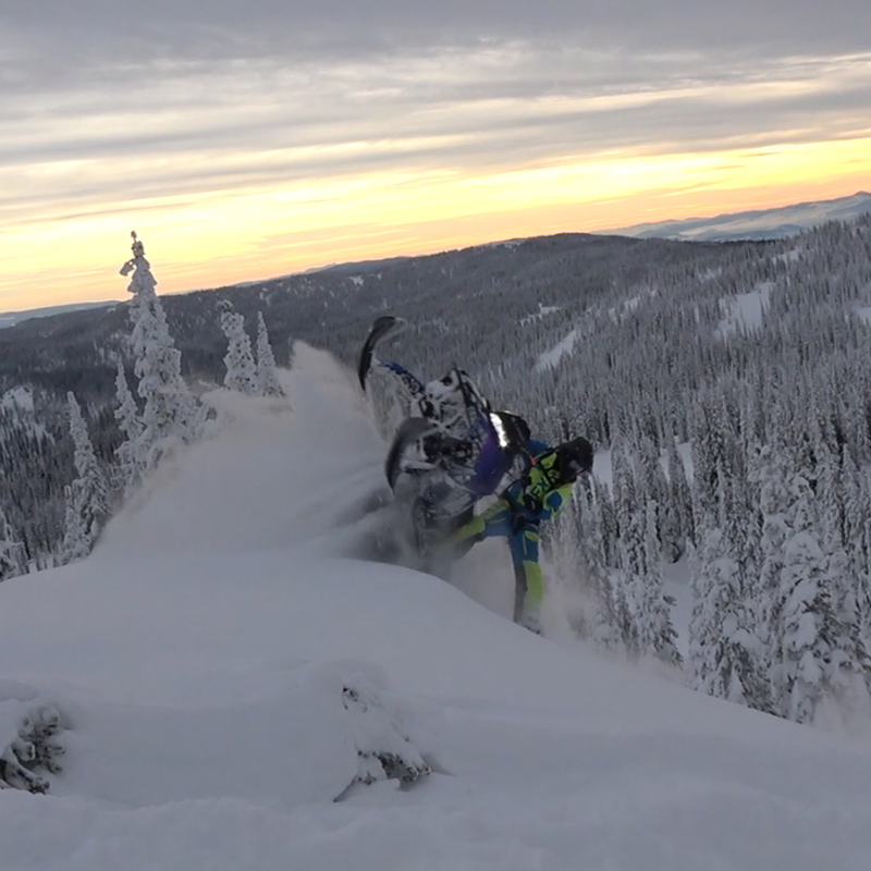 Andrew McKenzie does a re-entry on top of a mountain. 