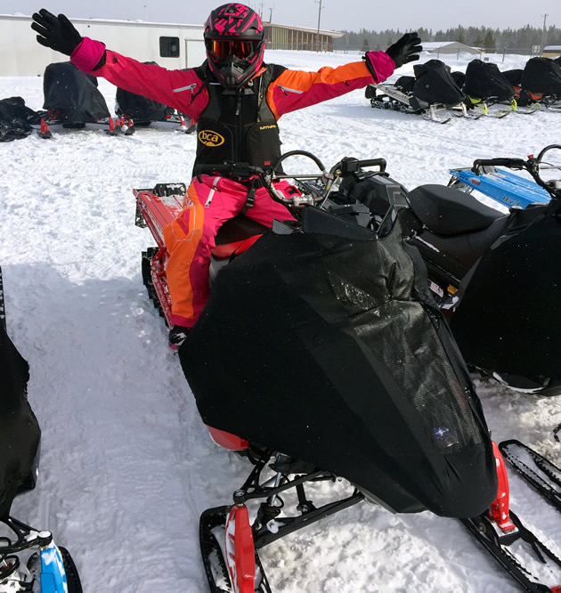 Trish Drinkle sitting on the new Polaris Patriot 850. 