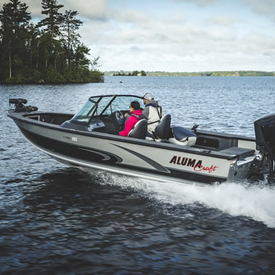 Two people in an Alumacraft boat. 