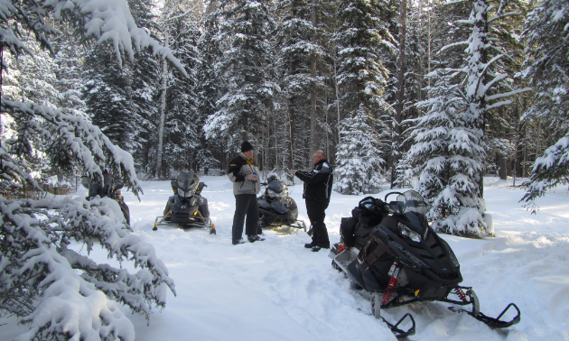 Dennis Irving, special projects, and Dave Bilsky, club president, checking out the trails before the annual club rally at the Junction off of the Trans Canada Snowmobile Trail to Grassy Lake and beyond.