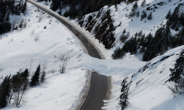 An explosive-controlled avalanche on the highway at Kootenay Pass.