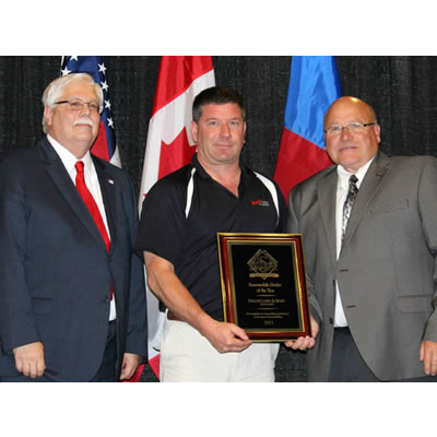 Pete Gassert accepts ACSA award from
Bob Kirchner, ACSA Vice President, and Duane Sutton, ACSA President