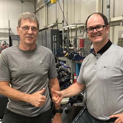 Berthold Fecteau pictured (left) with Sebastien Thibault, Race & Engine Calibration Manager. 