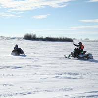 Erik Foster and his son, Kaine, sledding near Colonsay.