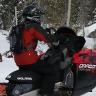 Man on a snowmobile in snow