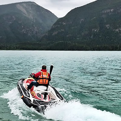 Search and Rescue watercraft on lake. 