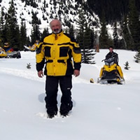 Jerry Bidulock (front) loves winter exploring from his Ski-Doo