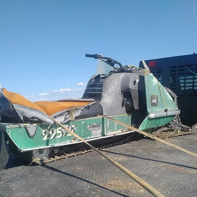 The John Deere sled, before being restored. 