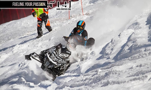 Keith Curtis working the terrain on his snowmobile