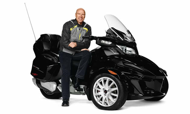 NHL hockey legend Mark Messier sits upon a BRP Can-Am Spyder