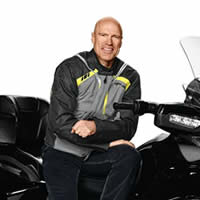 NHL hockey legend Mark Messier sits upon a BRP Can-Am Spyder