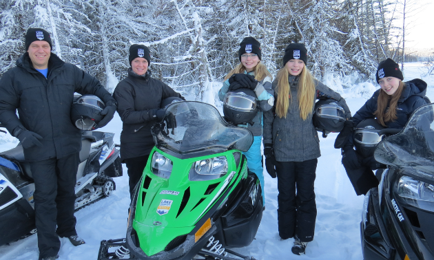 Trent and MaryAnne Larson ride the trails around Prince Albert with their children.