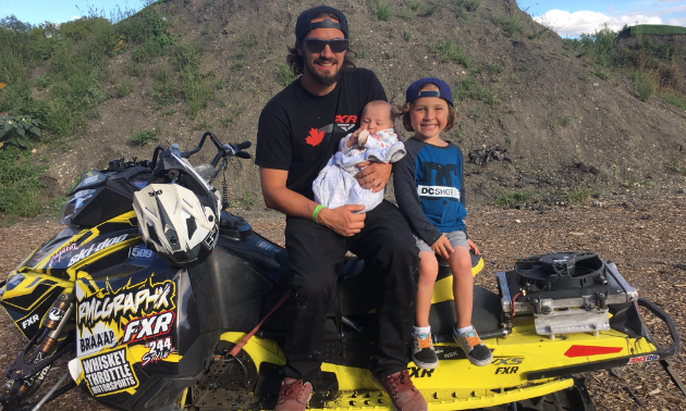 Poirier with his two kids, who love to watch him flying off the ramps.