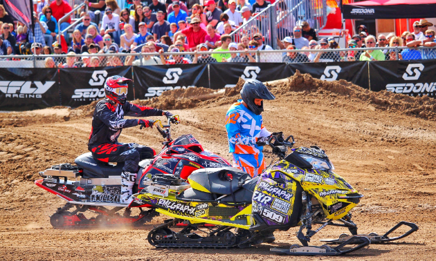 No snow? No problem for Mike Poirier. He's decked out his snowmobile for summertime mud riding.