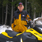 Man and snowmobile